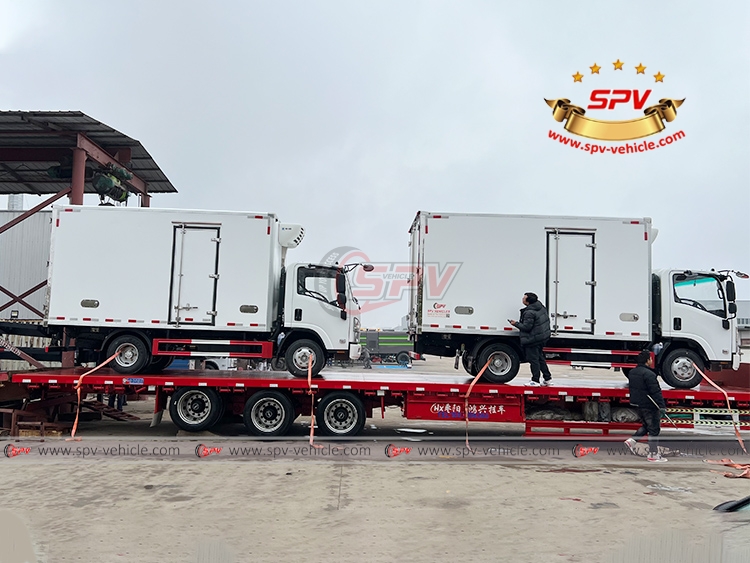 2 Units of ISUZU 4 Tons Reefer Trucks - Loading Onto Flatbed Trailer